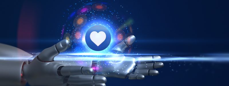 Roboterhand hält ein leuchtendes Herzsymbol - Künstliche Intelligenz in Dating Apps